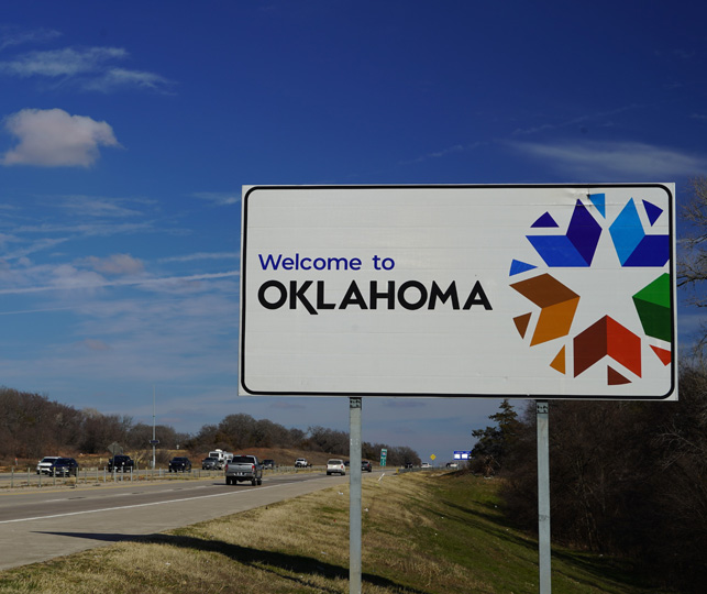 The "Welcome to Oklahoma" sign along a highway.